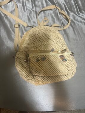 Woven Straw Mini Backpack with Tassel Accents - Natural